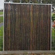 Bamboerolscherm in stalen frame